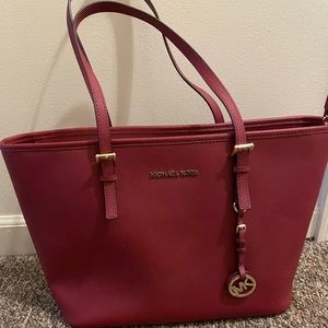 Michael Kors Jet Set Travel purse raspberry/red